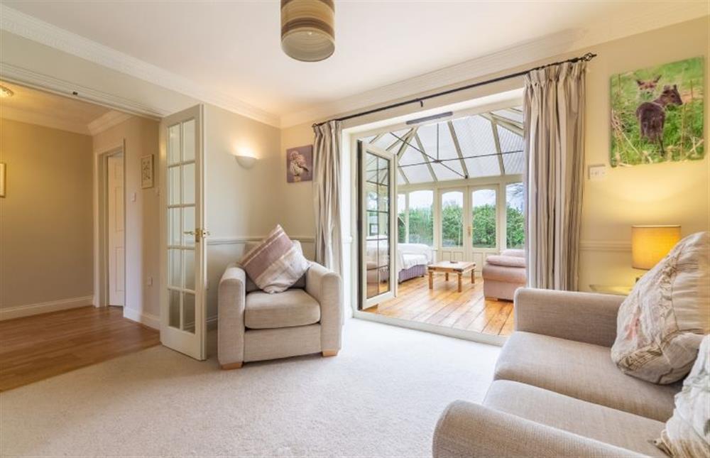 Ground floor: Sitting room leading to Conservatory