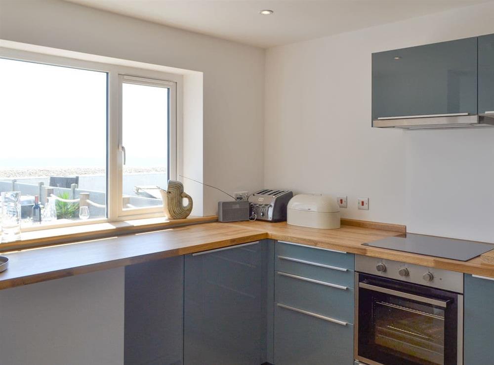 Well-equipped kitchen with sea views at Salty Lodge in Hayling Island, Hampshire