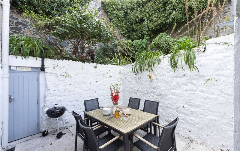 Enjoy a cup of tea on the patio at Salubrious Cottage, Cornwall