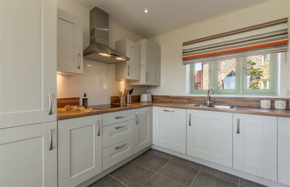 Ground Floor: A well-equipped kitchen at Samphire House, Bodham near Holt