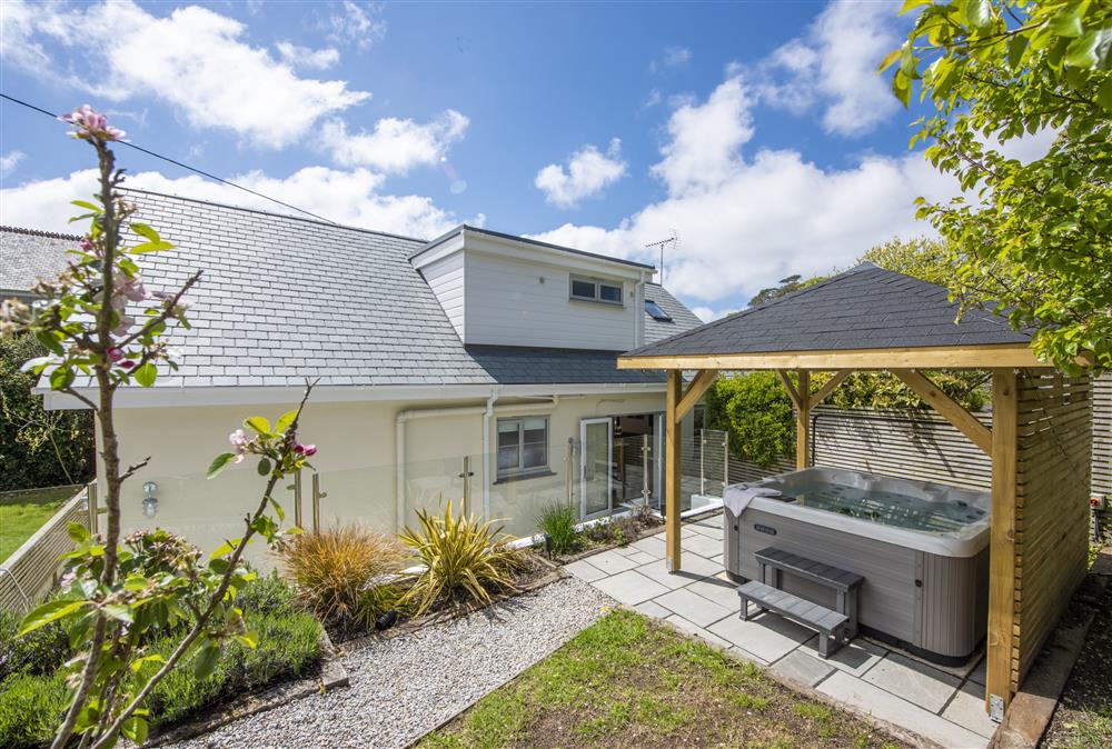 Sandbrook with its covered hot tub, perfect to enjoy all year round at Sandbrook, St Agnes