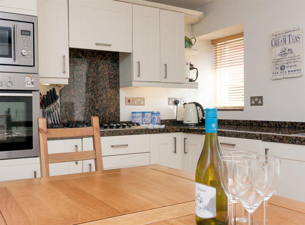 Charming kitchen/ dining room at Sandcastle in Salcombe, Devon