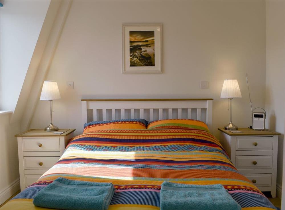 Comfortable double bedroom at Sandcastles in Swanage, Dorset