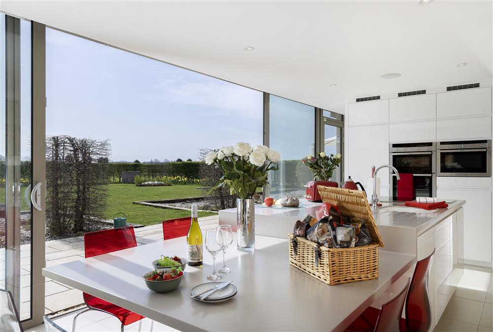 Contemporary dining with a view at Sandfields Barn, Luddington