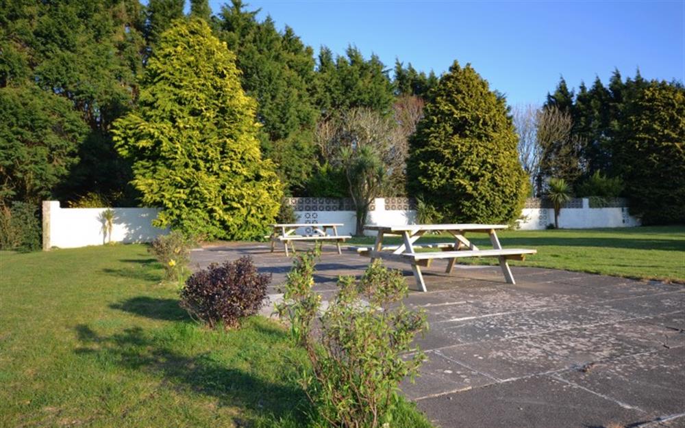 The communal gardens have plenty of picnic benches, perfect for dining alfresco during the warmer months. at Sandpiper in Dartmouth