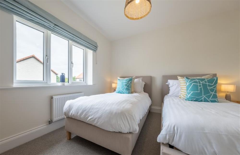 Bedroom three with 3’ full-size twin beds at Sandpiper House, Ingoldisthorpe near Kings Lynn