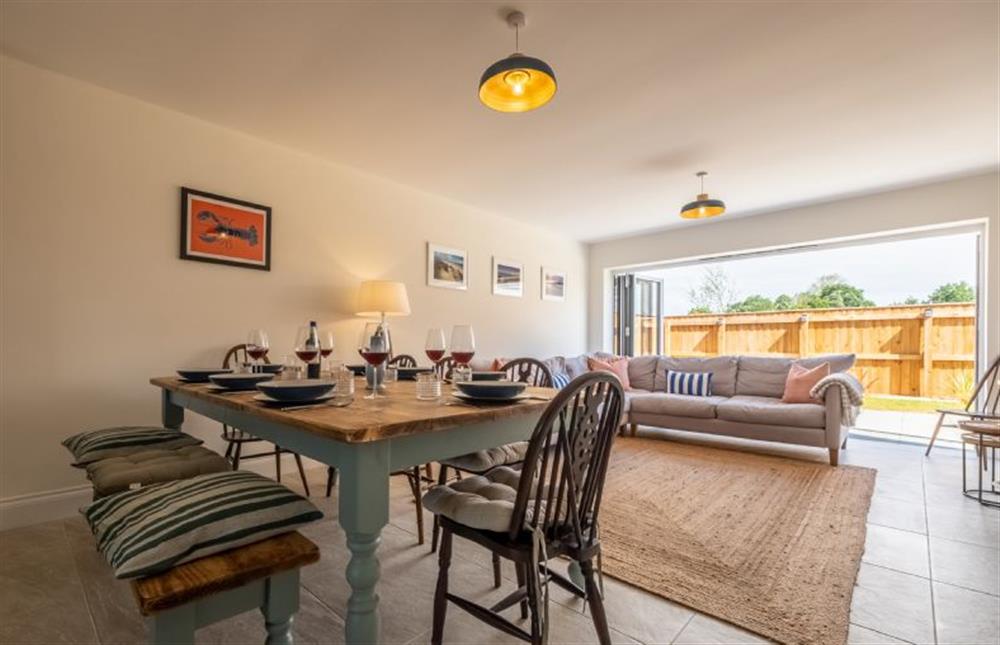 The dining area sits between the kitchen and living area (photo 2) at Sandpiper House, Ingoldisthorpe near Kings Lynn