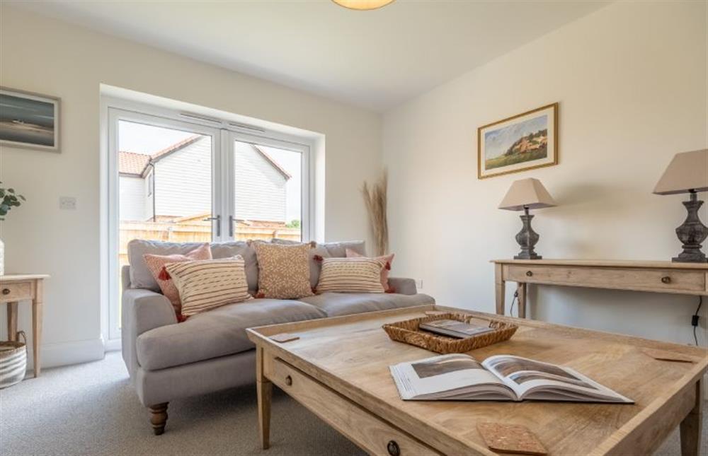 The sitting room has french doors to the garden (photo 2) at Sandpiper House, Ingoldisthorpe near Kings Lynn