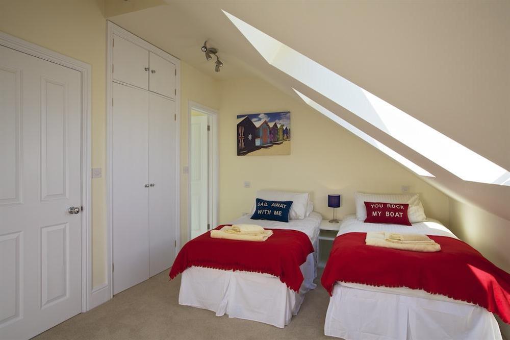 A further twin room (with sloping ceiling) on the top floor, with en suite at Sandpiper in , Salcombe
