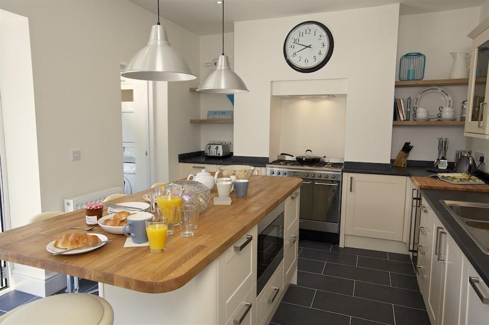 Beautiful kitchen with central island/breakfast bar (photo 2) at Sandpiper in , Salcombe