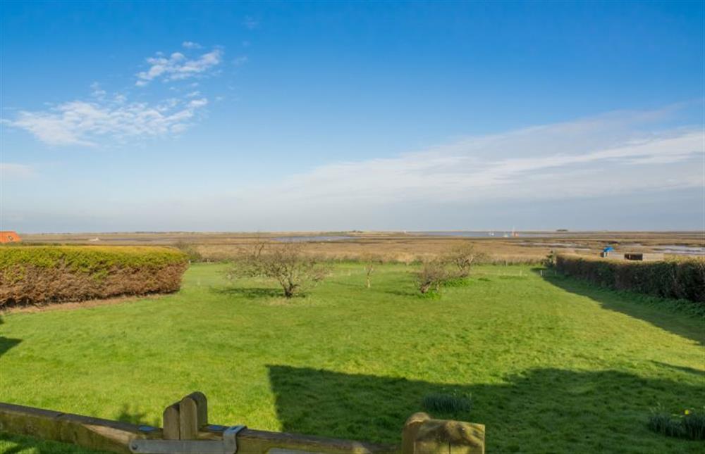 The garden leading to the marshes at Sandpipers, Brancaster Staithe near Kings Lynn