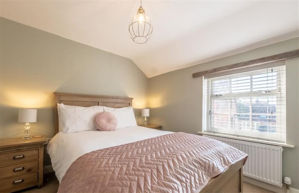Sandpiperfts Cottage: Master bedroom with a double bed  at Sandpipers Cottage, South Creake near Fakenham