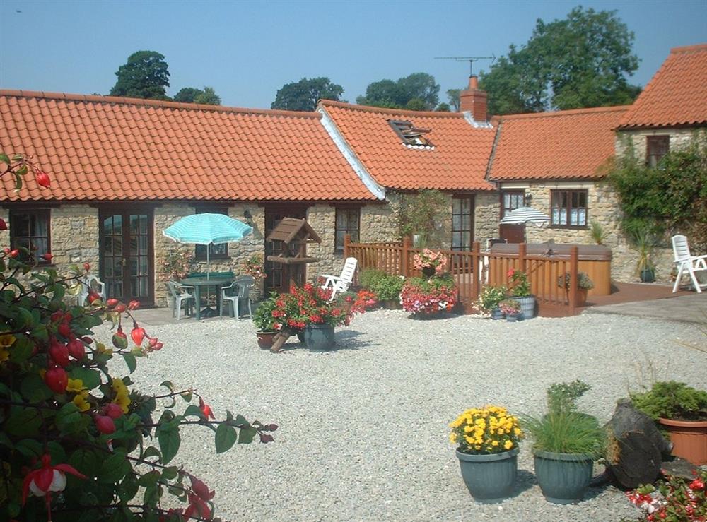 A photo of Honeysuckle Cottage at Sands Farm Cottages