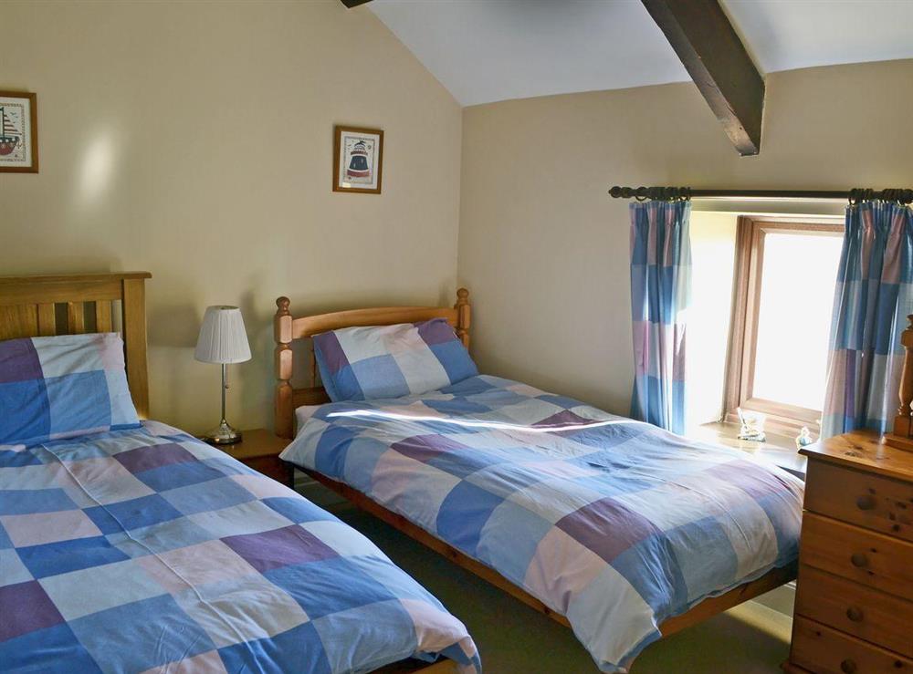 Cosy twin bedroom at Sandsedge Cottage in Morpeth, Northumberland