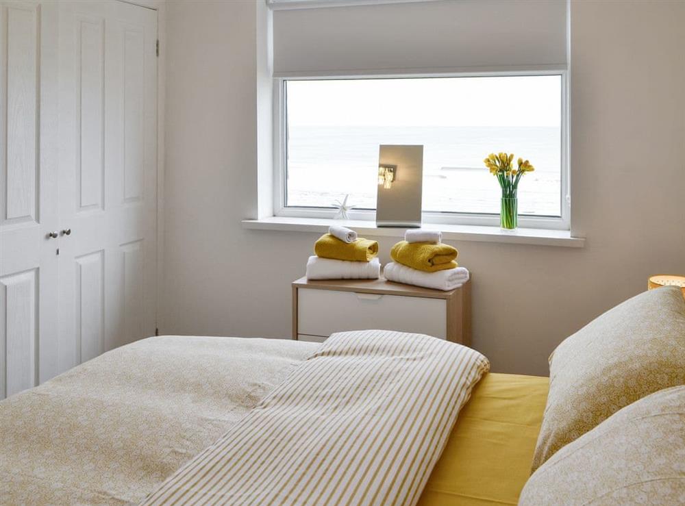 Peaceful double bedroom at Upper Sandstell Point, 