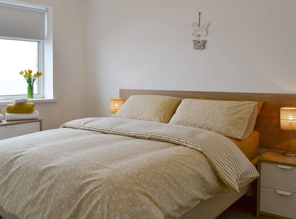 Relaxing double bedroom at Upper Sandstell Point, 