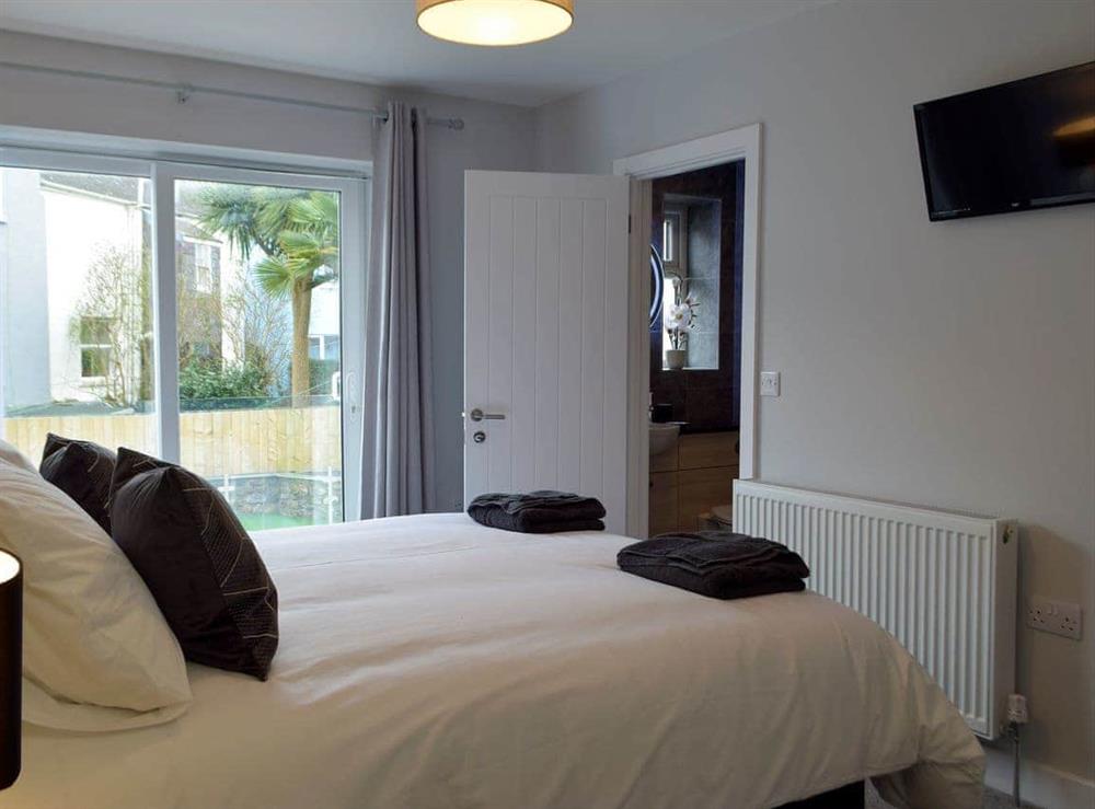 Comfortable bedroom with (photo 2) at Sandunes in Tenby, Dyfed