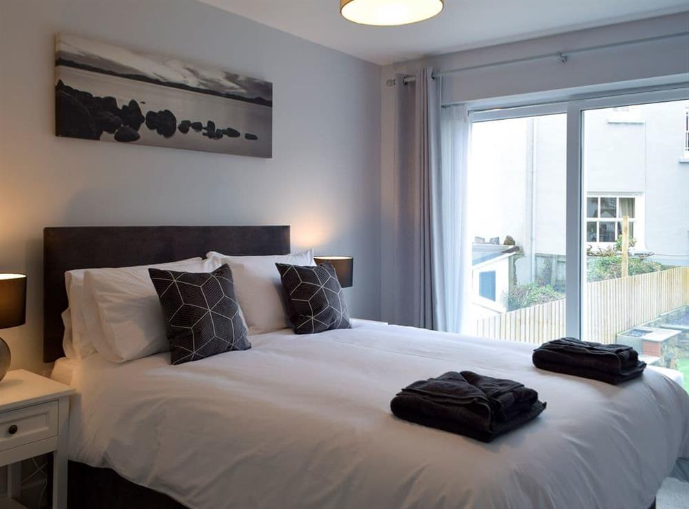 Comfortable bedroom with at Sandunes in Tenby, Dyfed