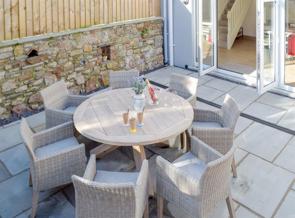 Furnished patio area at Sandunes in Tenby, Dyfed