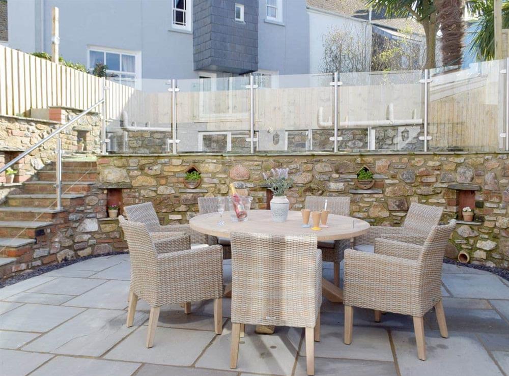 Stunning patio area with terraced garden level at Sandunes in Tenby, Dyfed