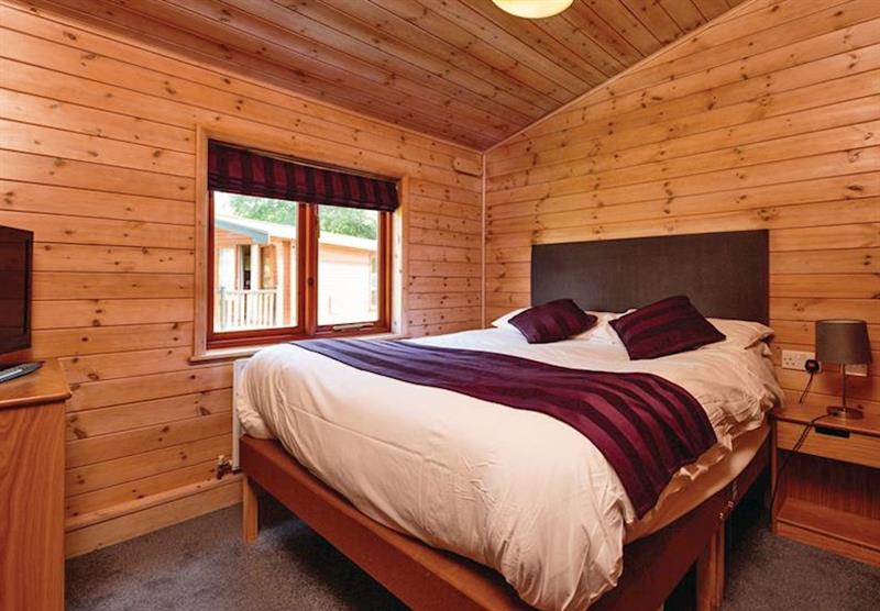 Double bedroom at the Premium Plus 6 Lodge at Sandy Balls Holiday Village in Godshill, Fordingbridge