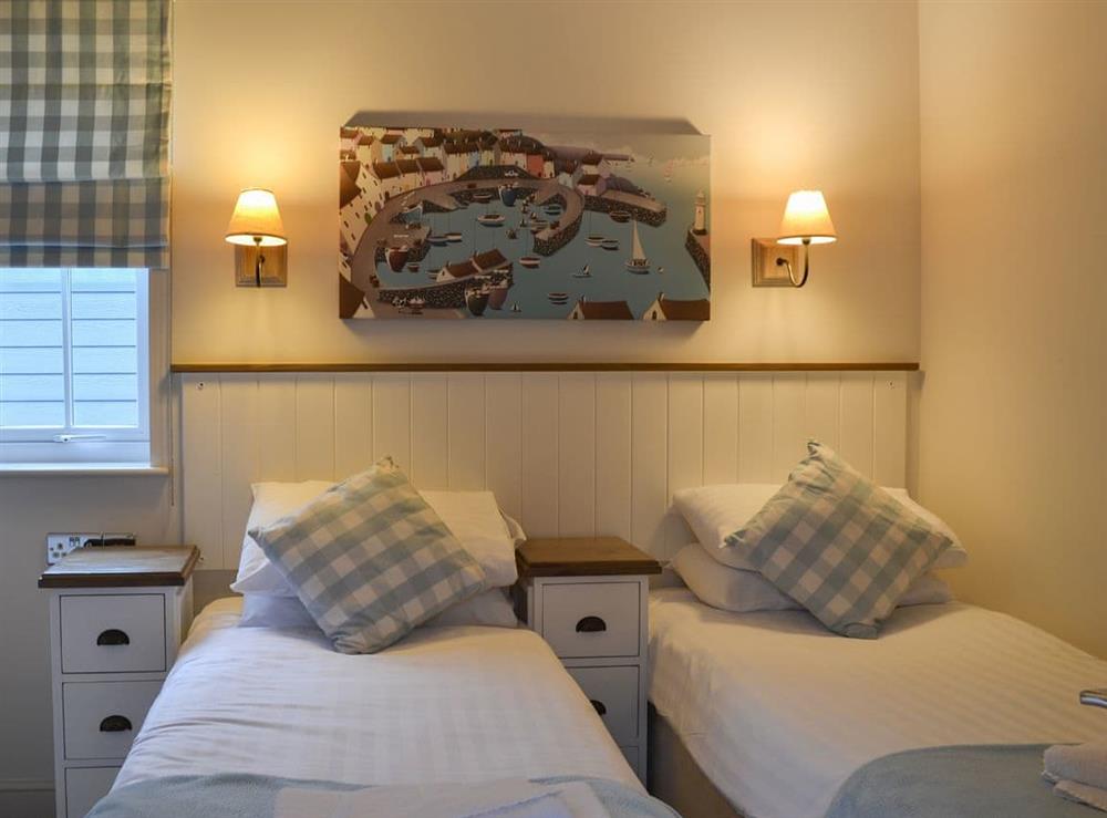 Marvellous second bedroom with twin single beds at Sandy Bay Beach House in The Bay, Filey, North Yorkshire