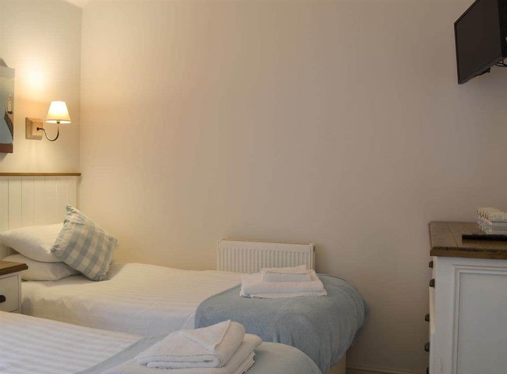 Peaceful twin bedded room at Sandy Bay Beach House in The Bay, Filey, North Yorkshire