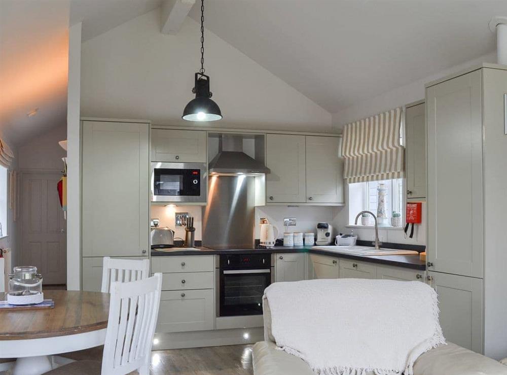 Well equipped kitchen area at Sandy Bay Beach House in The Bay, Filey, North Yorkshire
