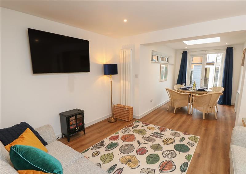 Relax in the living area at Sandy Cottage, Sandown