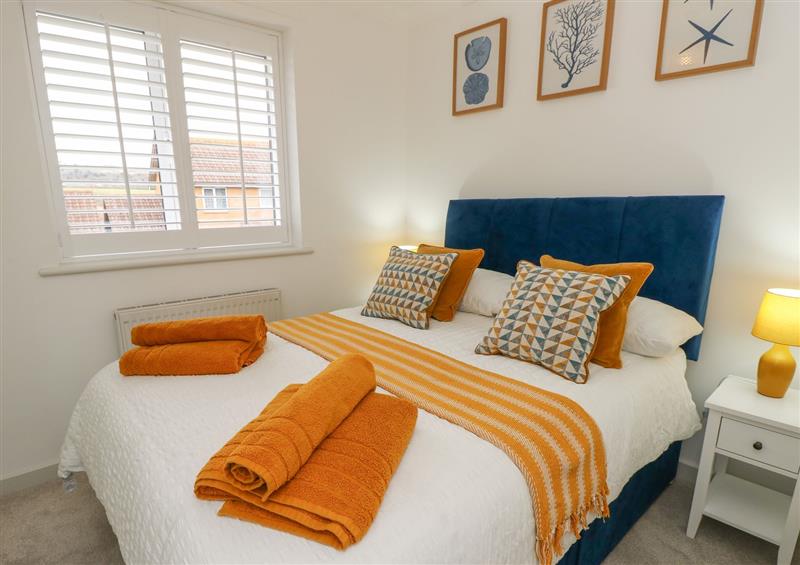 This is a bedroom at Sandy Cottage, Sandown