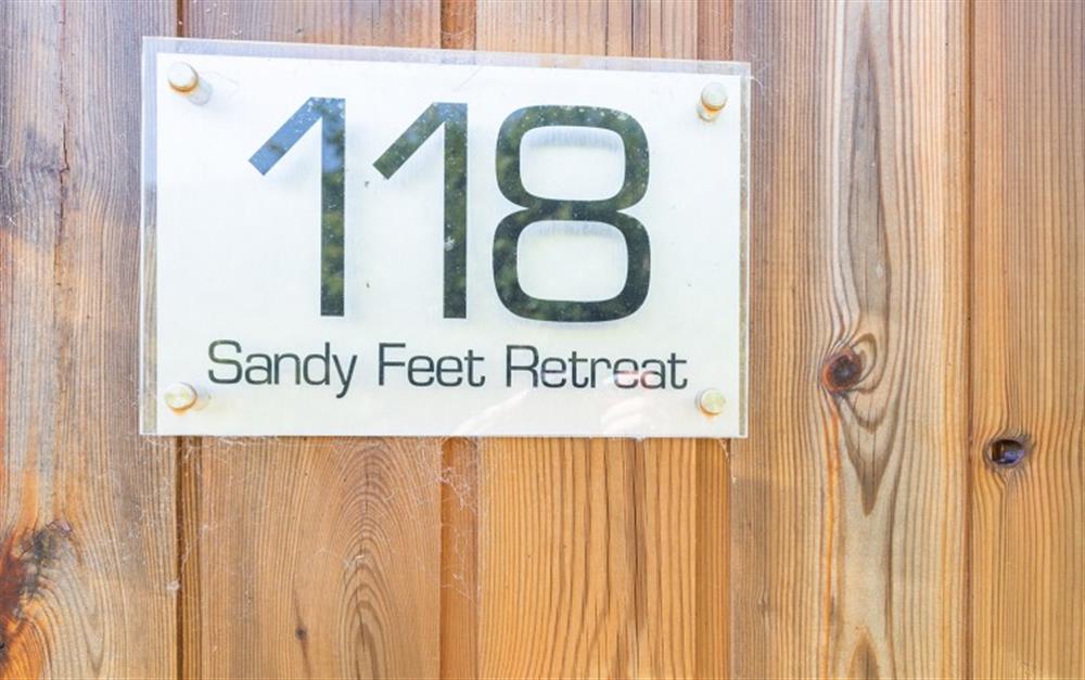 Villa sign at Sandy Feet Retreat in Looe