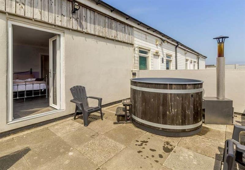 Stable Cottage with its hot tub at Sandy Park in Crimdon, County Durham