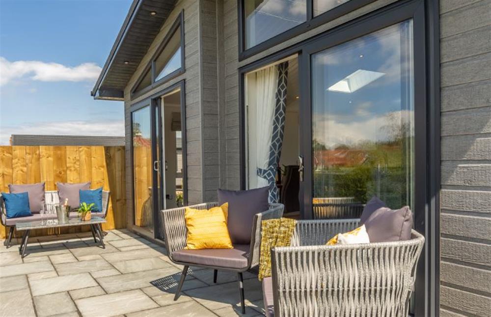 Ground floor: Outside deck and seating at Sandy Toes, Burnham Market near Kings Lynn