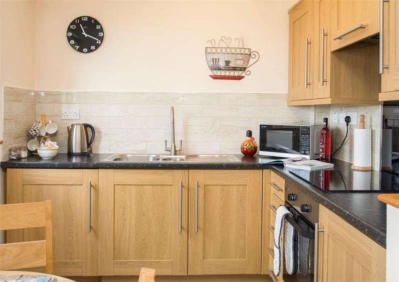This is the kitchen at Sandy Toes, Rhosneigr