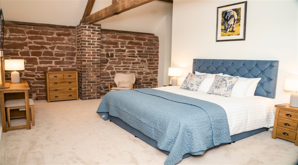 The super king-size bedroom on the first floor of Sandybury Barn, Shropshire at Sandybury Barn in Bridgnorth, Shropshire