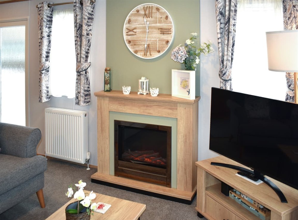 Living area (photo 2) at Sandycove 23 in Paignton, Devon