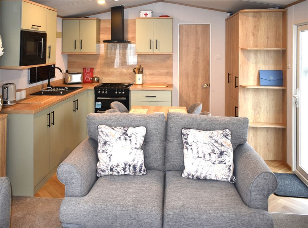 Open plan living space at Sandycove 23 in Paignton, Devon