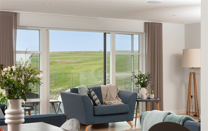Relax in the living area (photo 3) at Sandyford, Cornwall