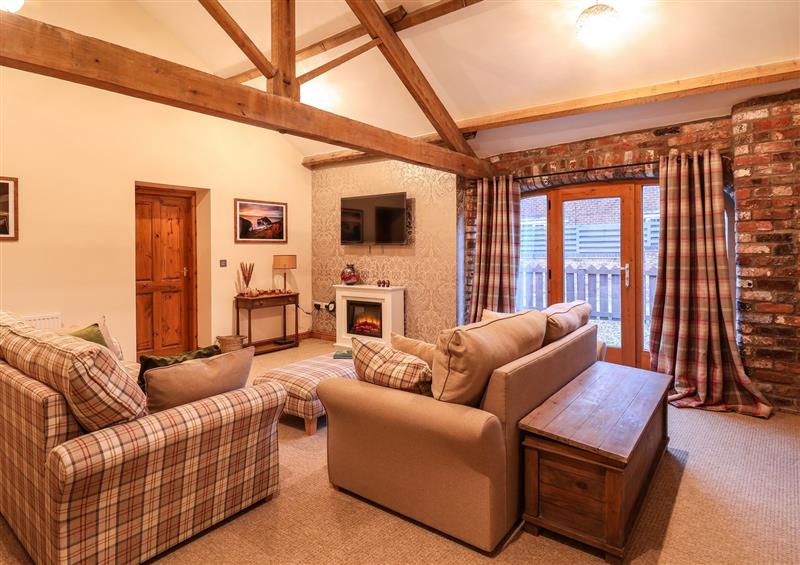 Relax in the living area at Sarahs Cottage, Flamborough