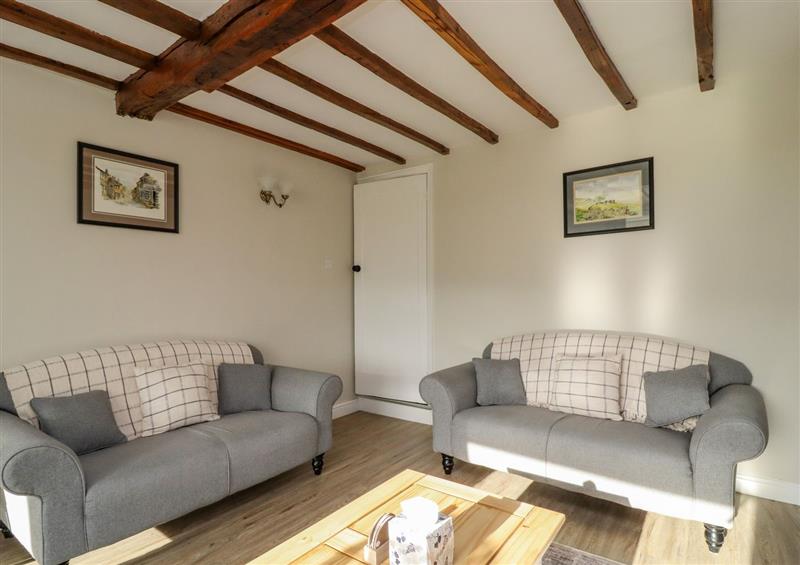 Relax in the living area at Sarahs Cottage, Stanbury