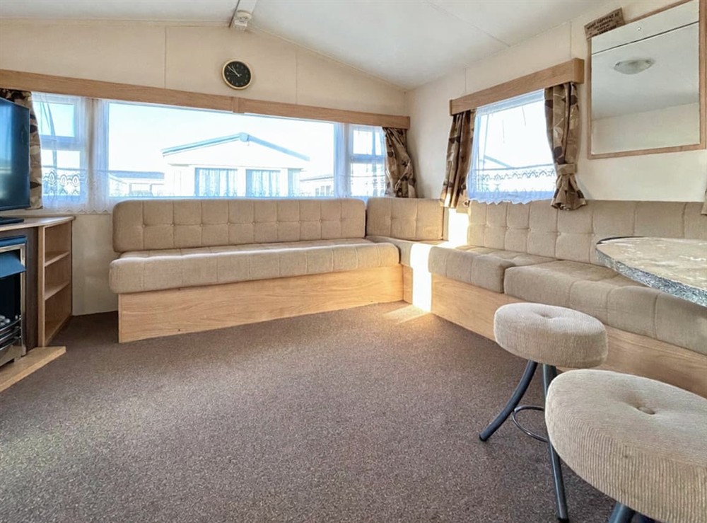 Living area at Sarahs Island Retreat in Hayling Island, Hampshire