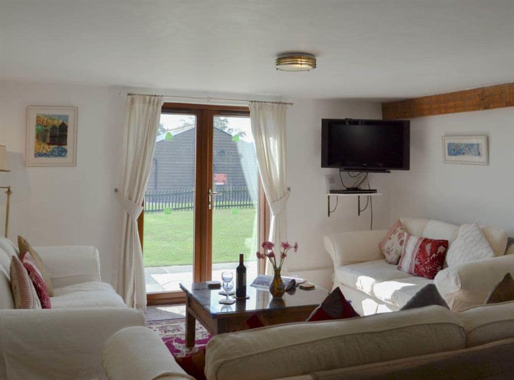 Comfortable living room at Saunders Oast Barn in Guestling, Nr Hastings, East Sussex., Great Britain