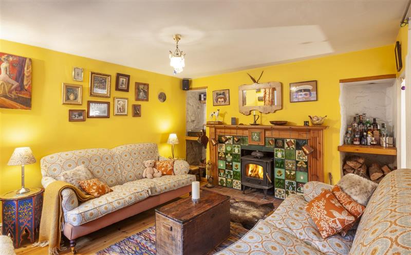 Relax in the living area at Sausage Cottage, Nr Bampton