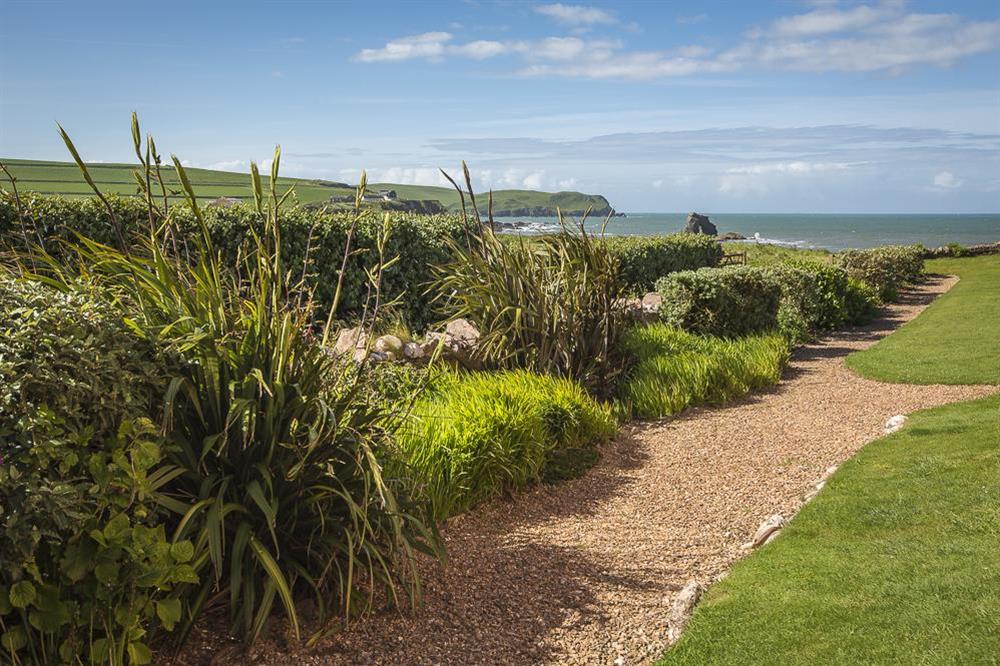 Beautiful gardens with views of Thurlestone Sands at Savernake in , Thurlestone