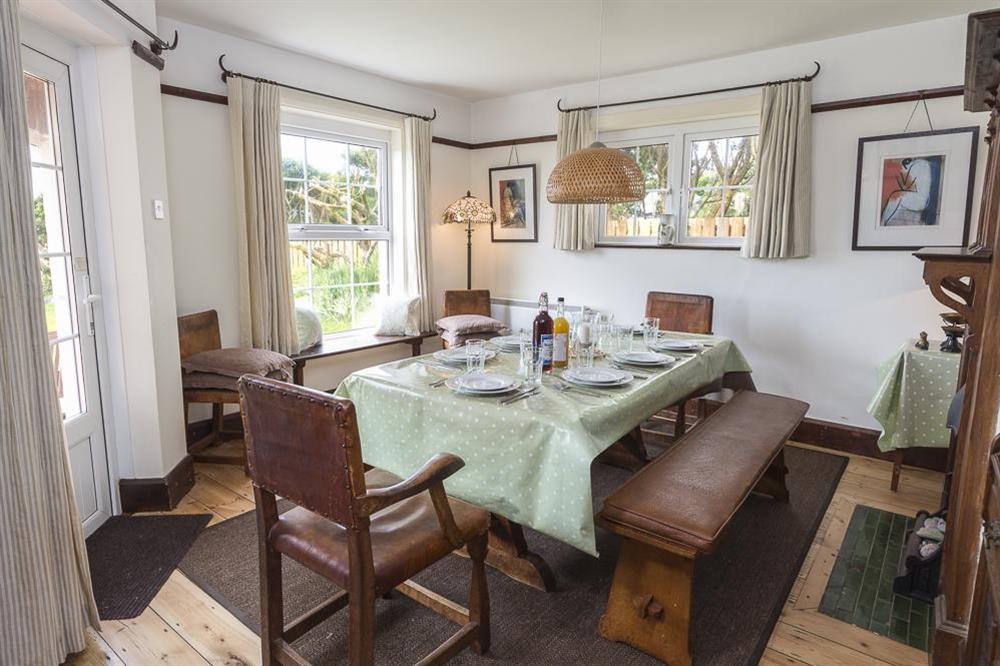Dining room with lovely views and door out to the garden at Savernake in , Thurlestone