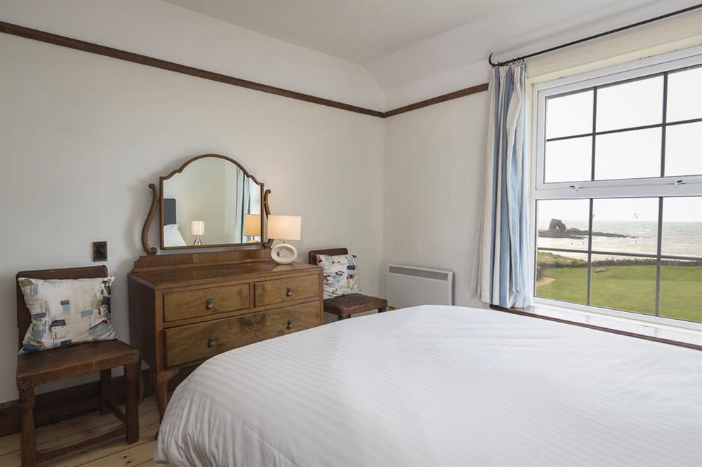 Second bedroom with King-size bed and lovely views towards Thurlestone Rock (photo 2) at Savernake in , Thurlestone