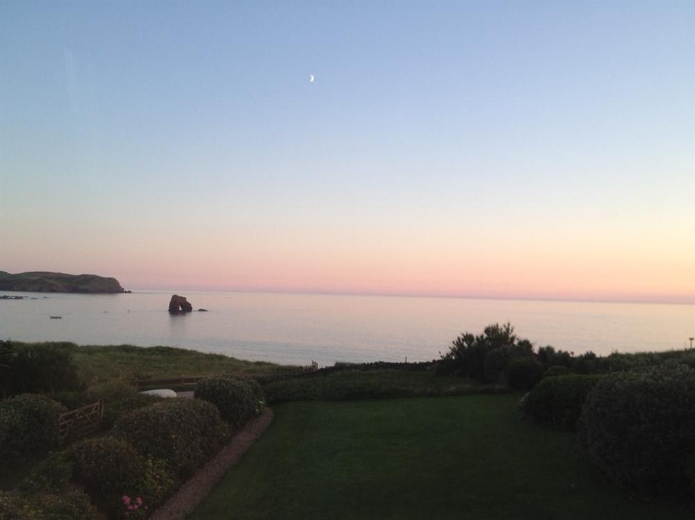 Watch the sun set over the beach from the property at Savernake in , Thurlestone
