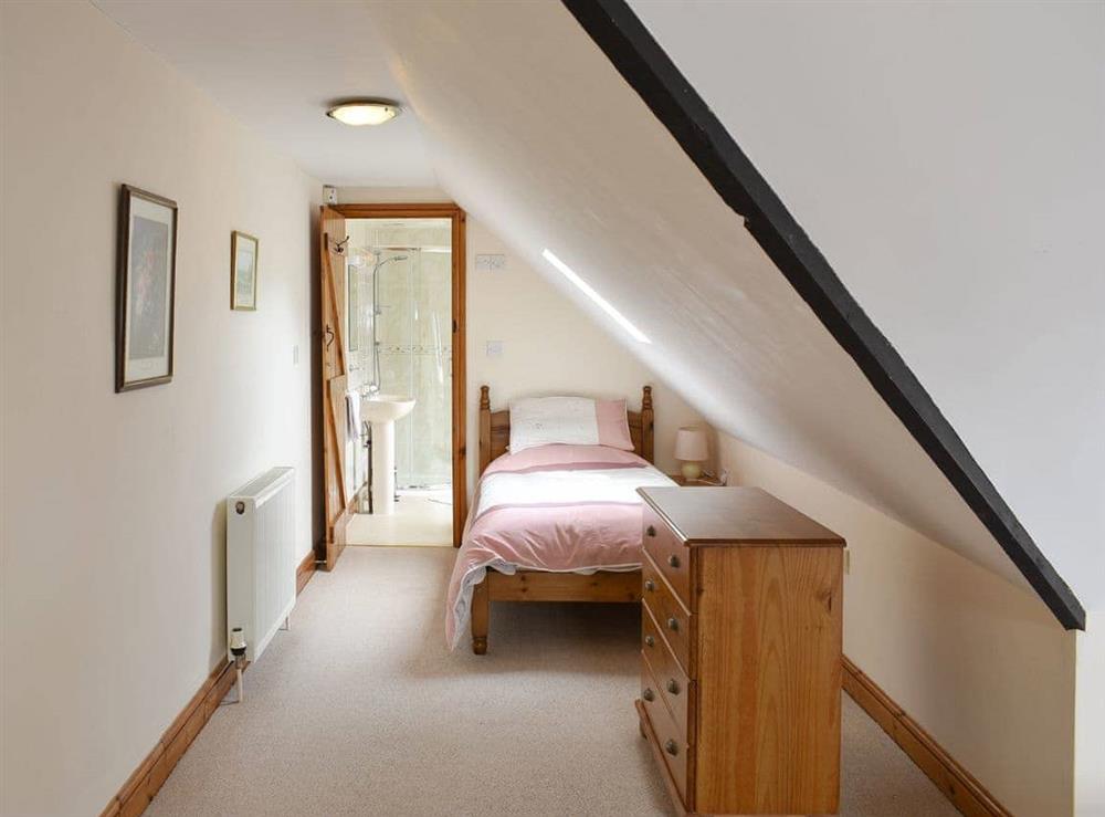 Cosy single bed area within the en-suite triple bedroom at Sawmill Cottage in Puncknowle, Dorchester., Dorset