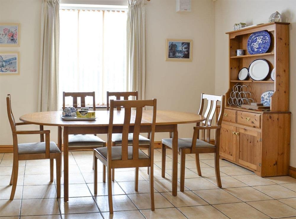 Spacious dining area at Sawmill Cottage in Puncknowle, Dorchester., Dorset