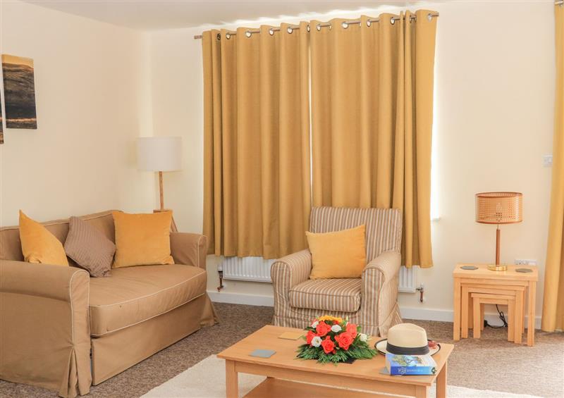 Relax in the living area at Sawtons Cottage 1, Dawlish